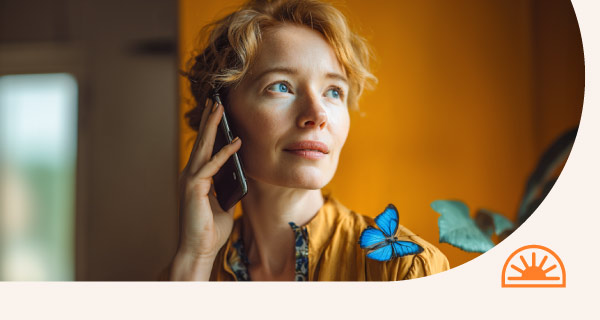 A woman speaking on the phone.